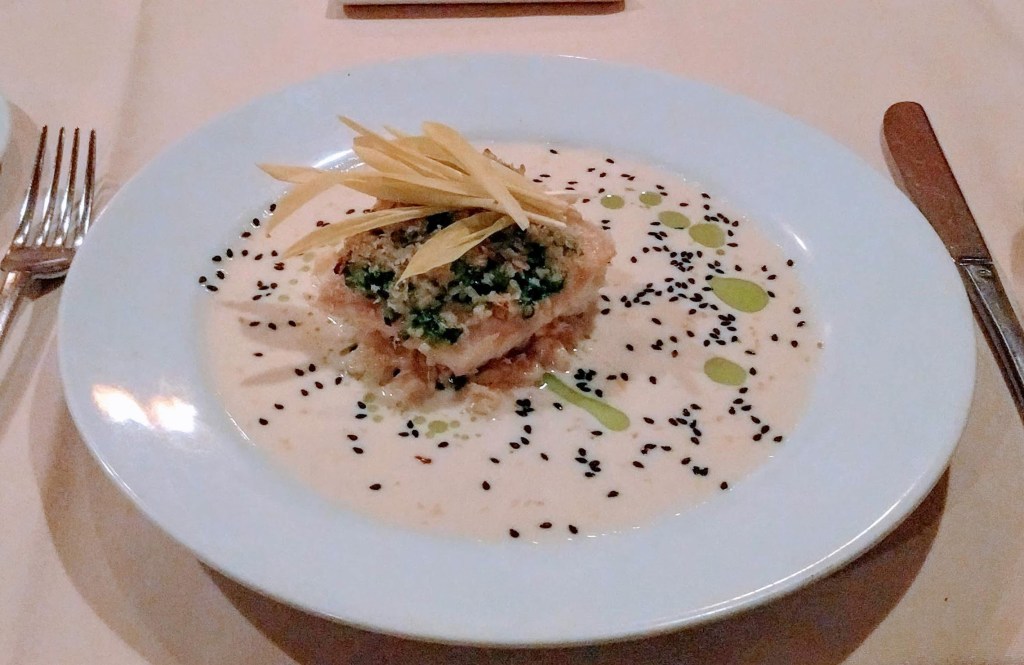 red snapper on miso sesame vinaigrette with mushrooms and corn.