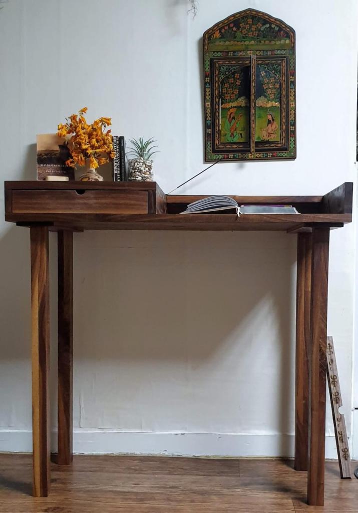A hand crafted writing desk.